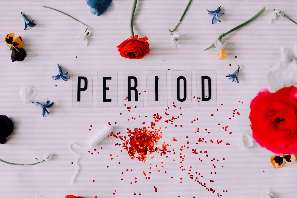 the word period with flowers around